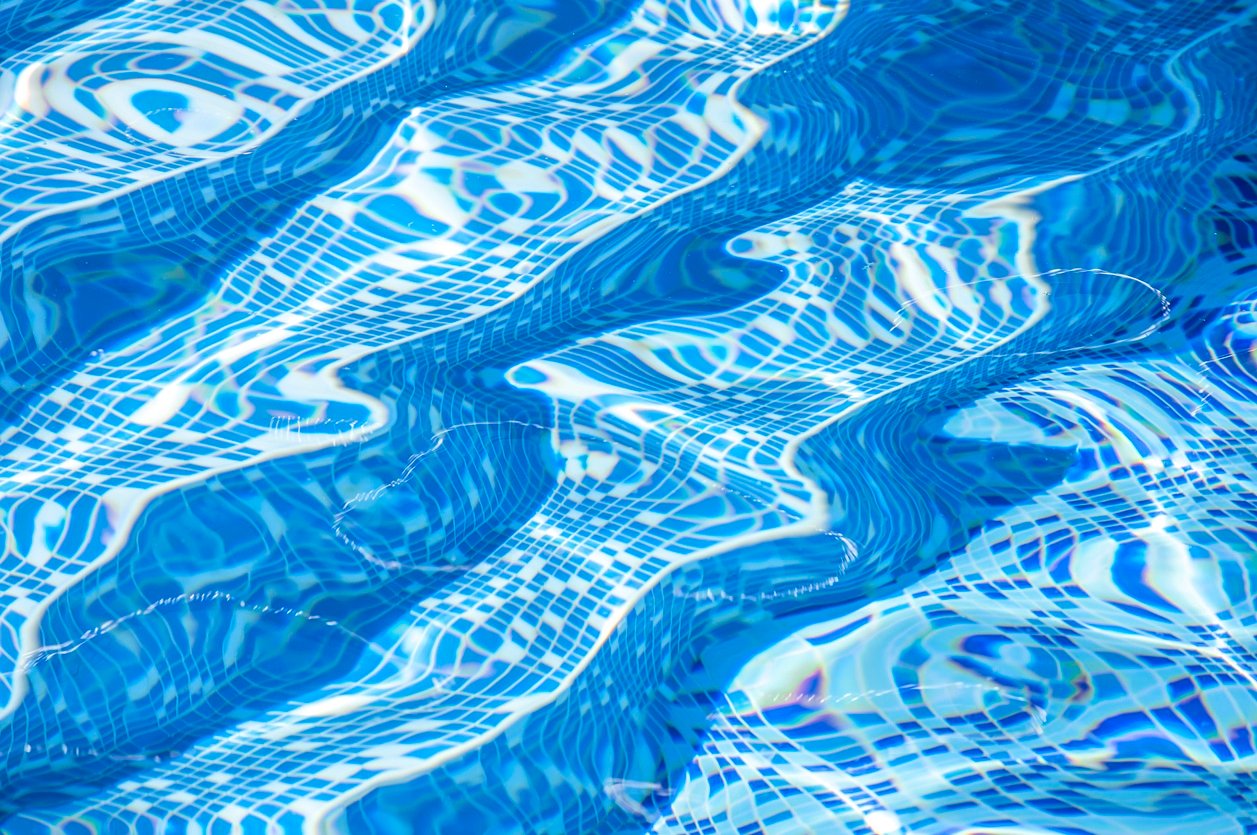 Beautiful refreshing blue swimming pool water